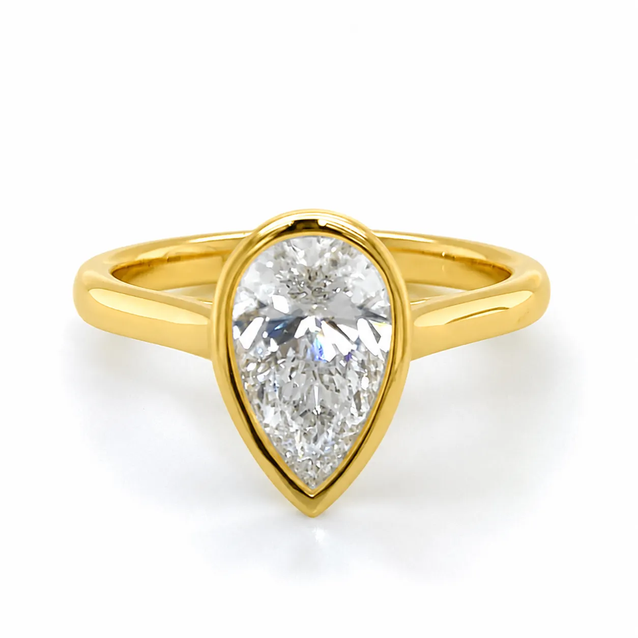 18ct Yellow Gold Pear Shape Bezel Set Engagement Ring â€“ 1.51ct Igi Certified Diamond