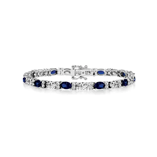 Sterling Silver 6x4 Oval Cz Claw Set Bracelet 